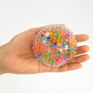 Piłka gniotek z kolcami i kuleczkami